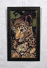 Вышивка «Леопарды» 38,0х21,5
(рамка пластиковая, стекло стандартное, оргалит, установка работы в раму, натяжка)
